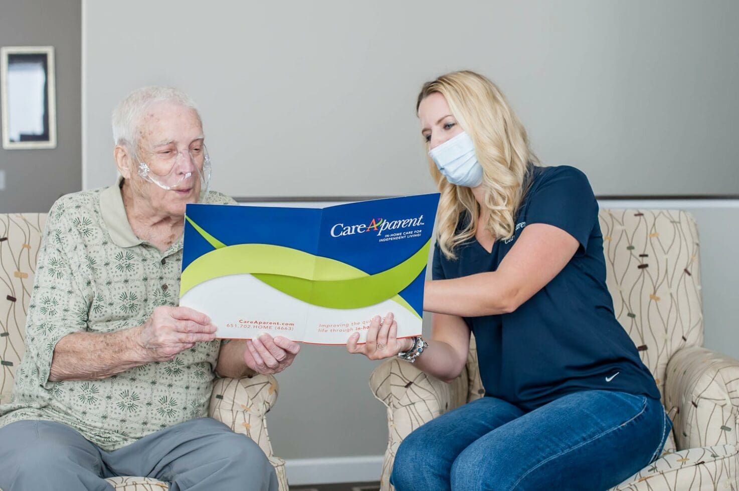 woman discusses at-home care with senior